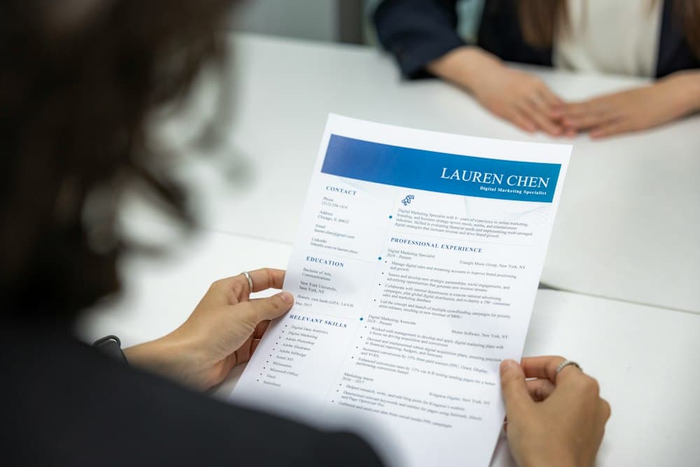 Recruiter reading a candidate's résumé